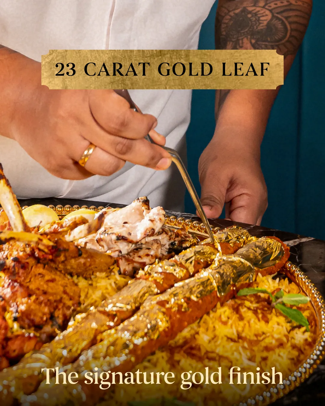 The signature gold finish: 23-carat gold leaf being laid over the seekh kebabs